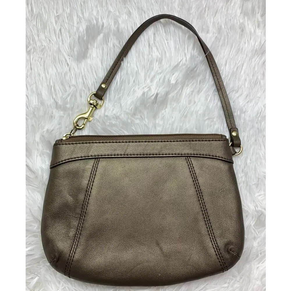 Coach bronze wristlet